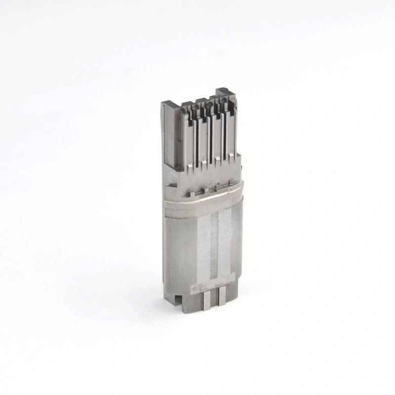 Upright precision machined metal component with multiple narrow slots and stepped edges